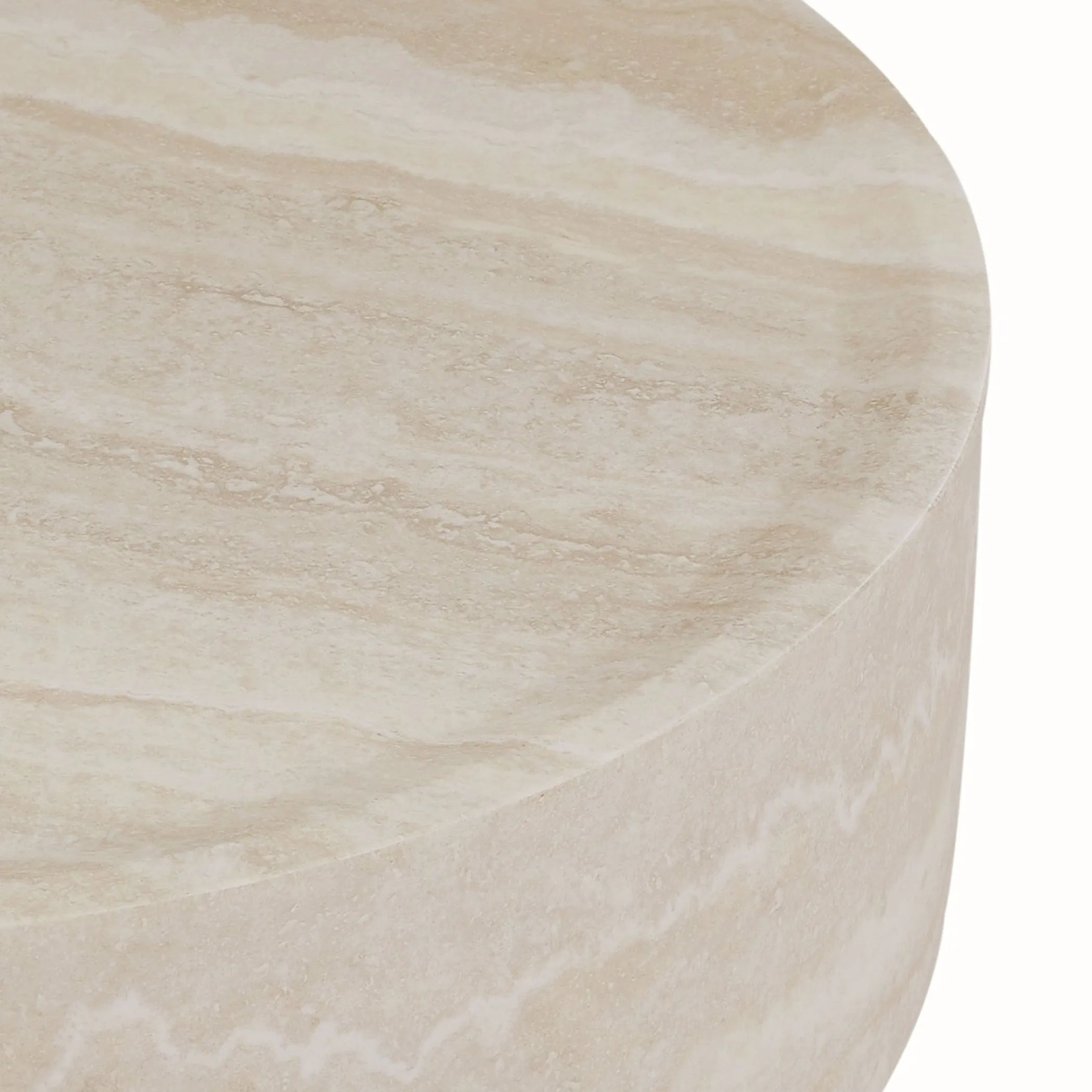 Close-up of a round beige marble table