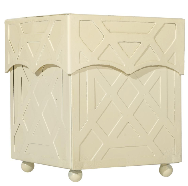 Cream tissue box holder with geometric pattern on a white background