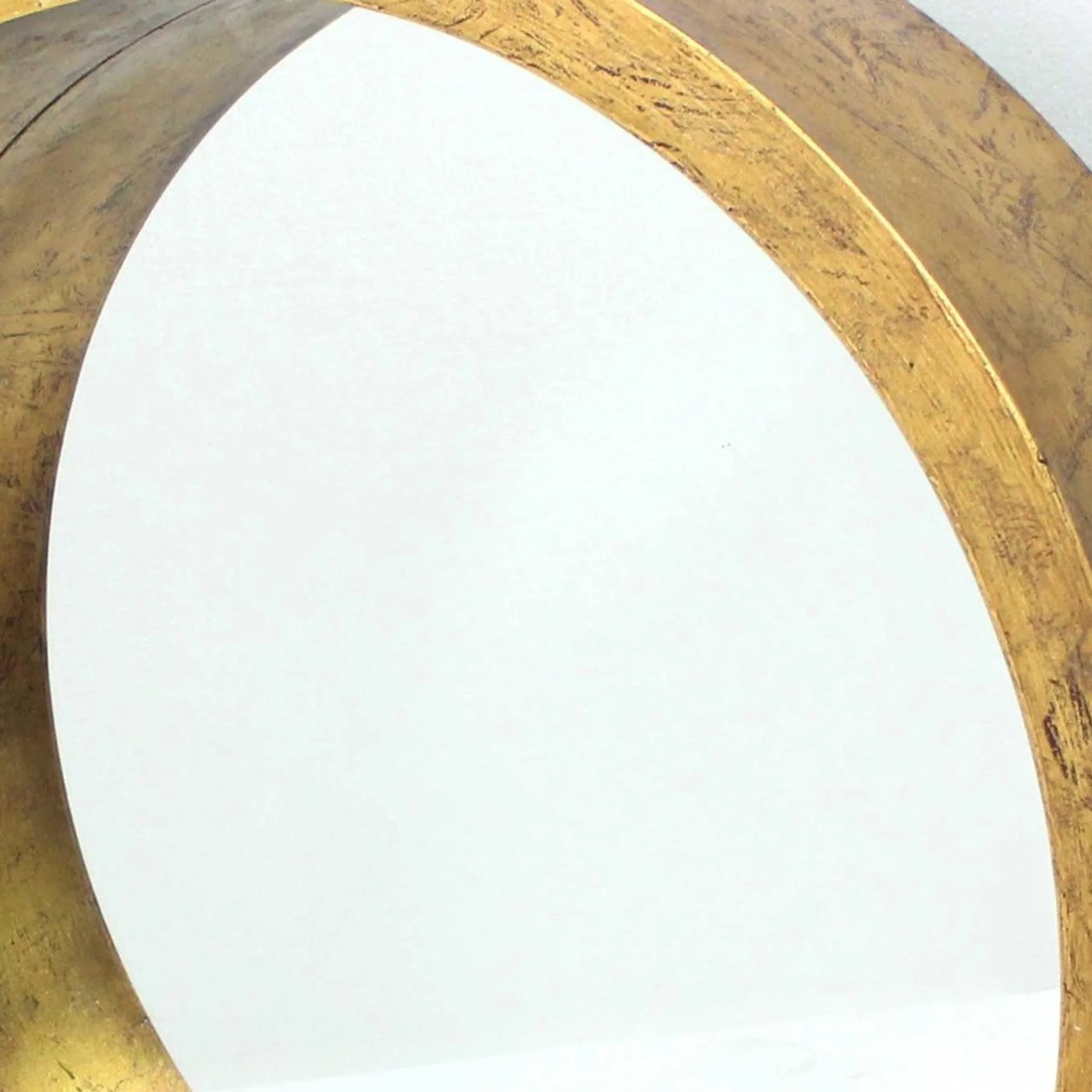 Close-up of a gold circular object on a white background