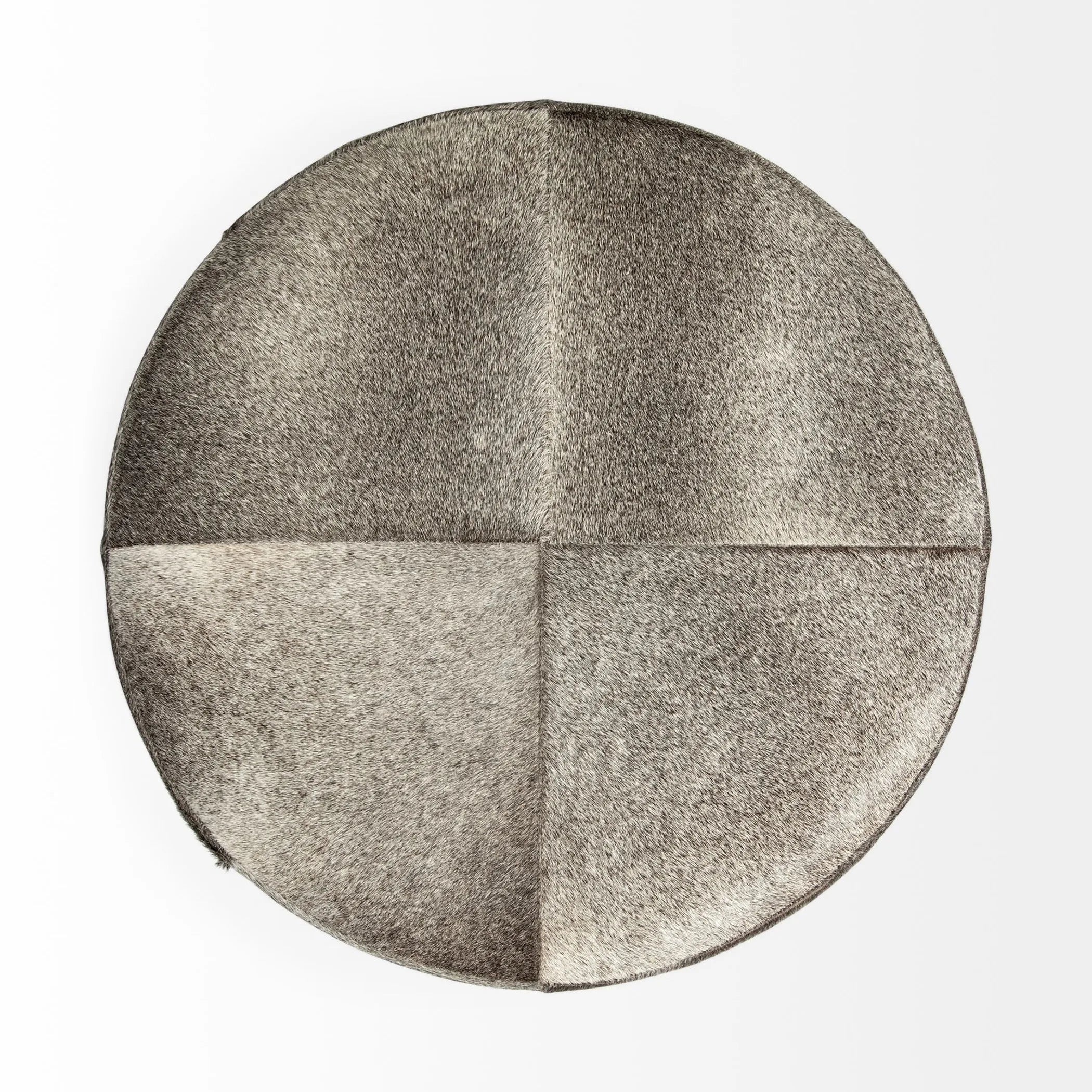 Overhead view of a gray and brown wool upholstered ottoman on a white background