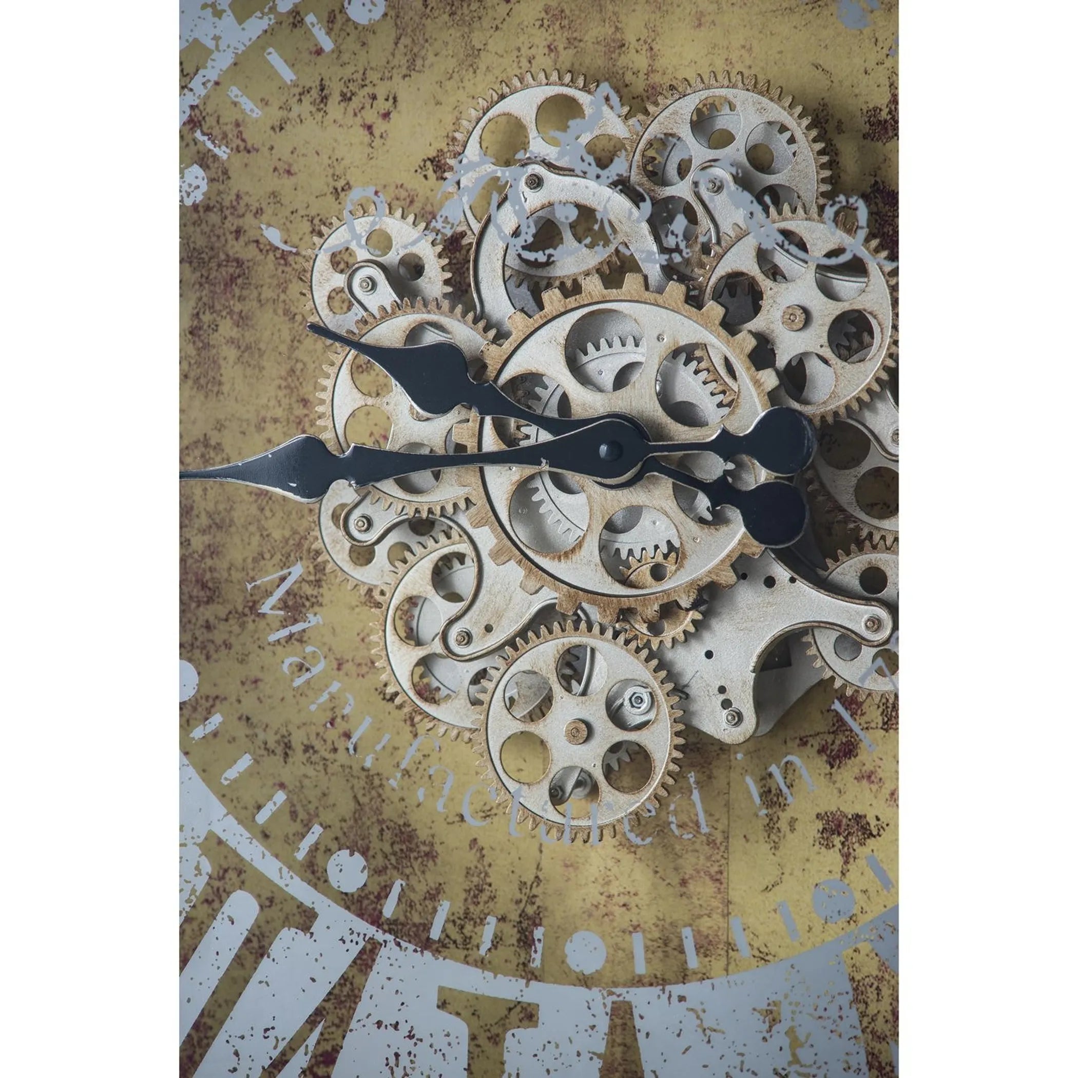 Decorative wall clock with mechanical gears on a textured background