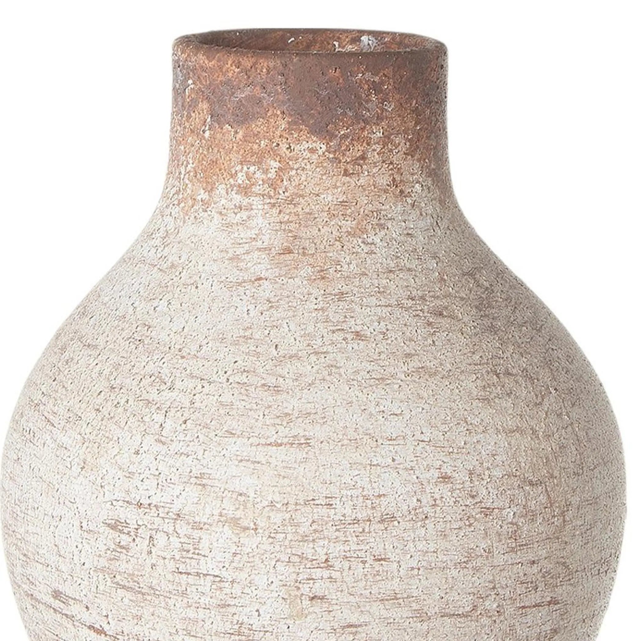 Close up of a textured ceramic vase on a white background