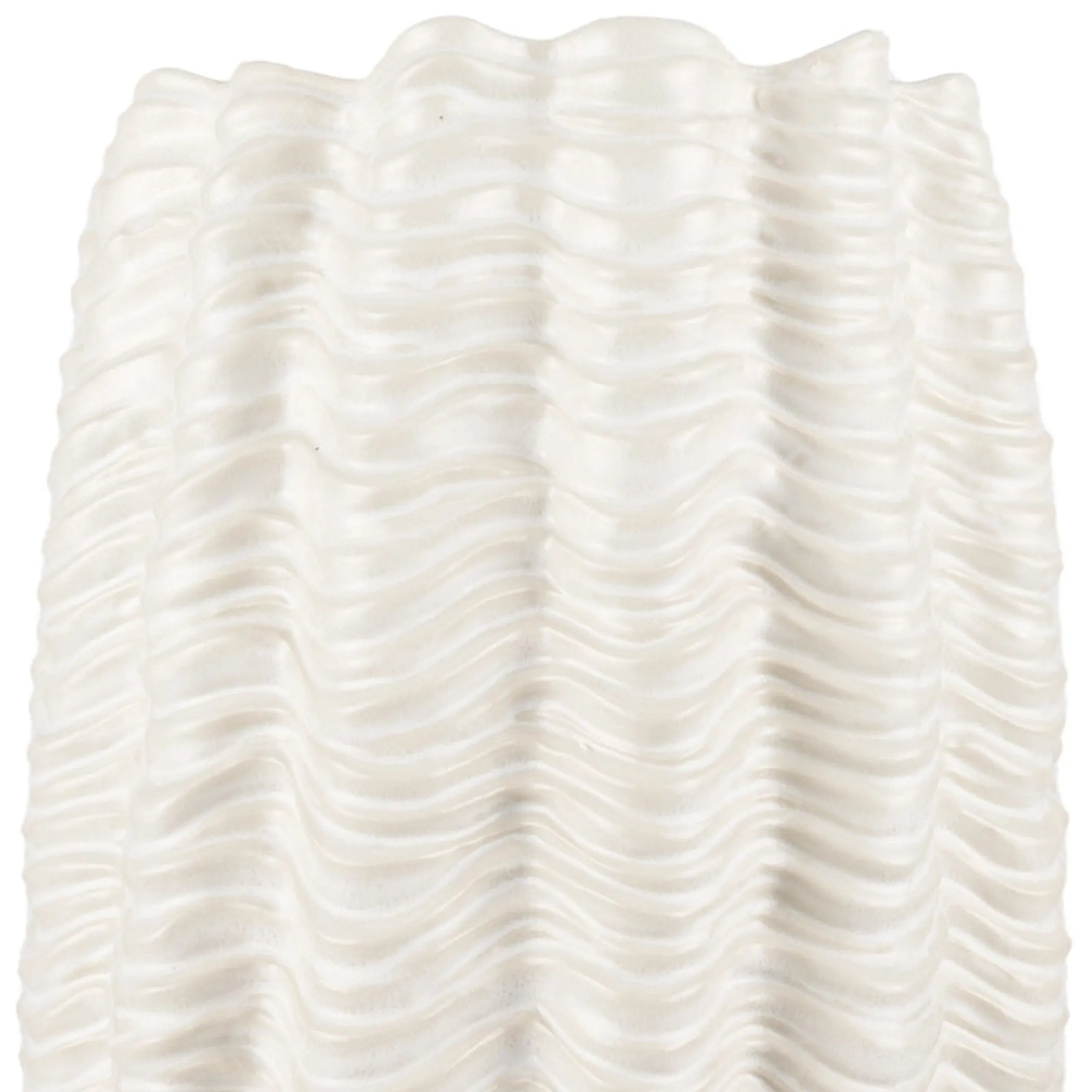 Close up of a textured vase on a white background