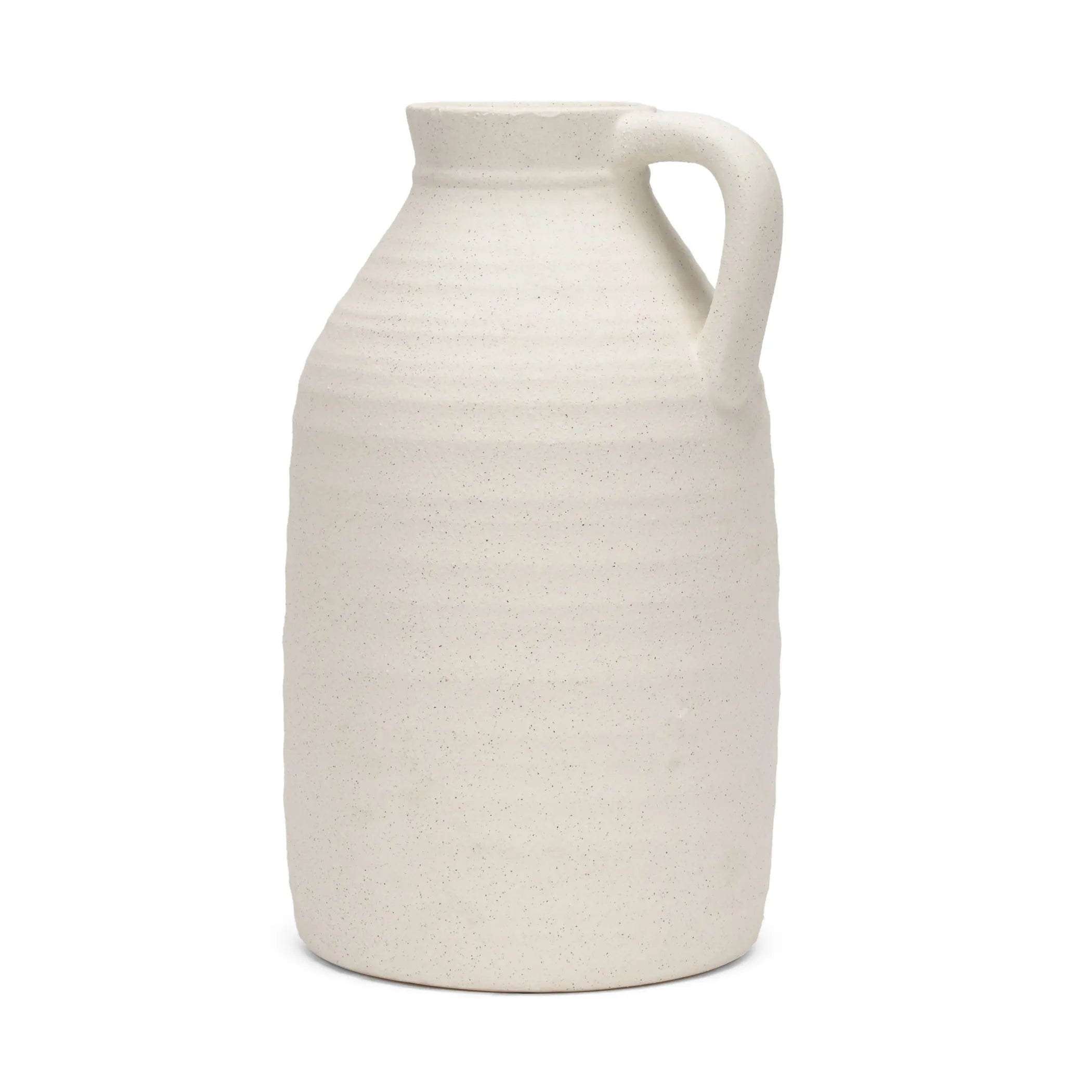 White ceramic pitcher on a white background