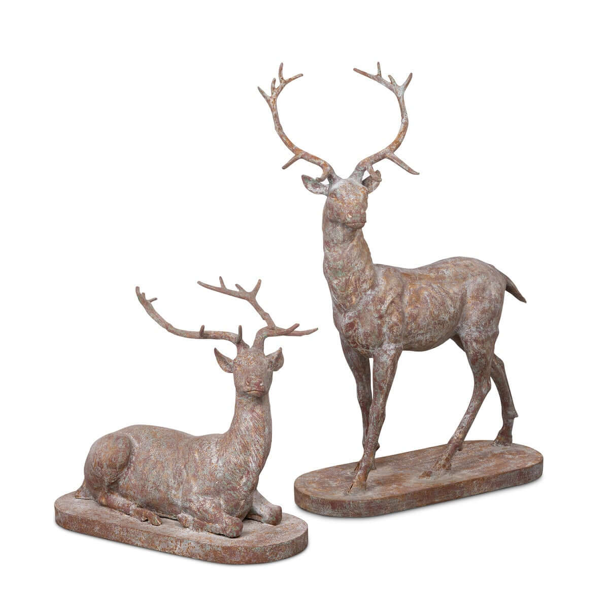 Two deer statues, one standing and one lying down, on a white background
