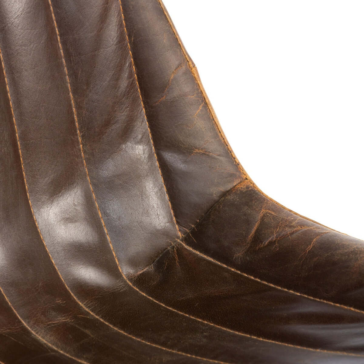 Close-up of a brown leather boot with visible texture and wear.