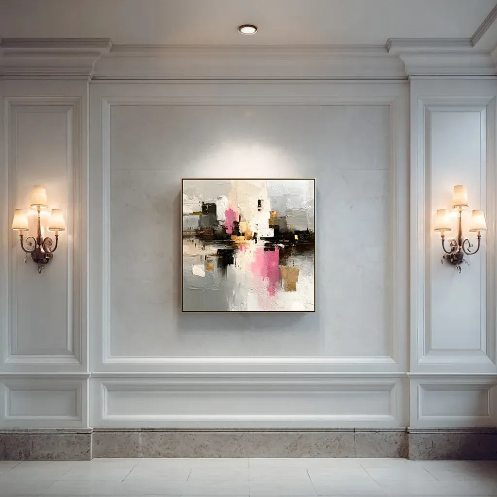 Modern interior with a abstract painting on a wall, wall sconces, and large windows.