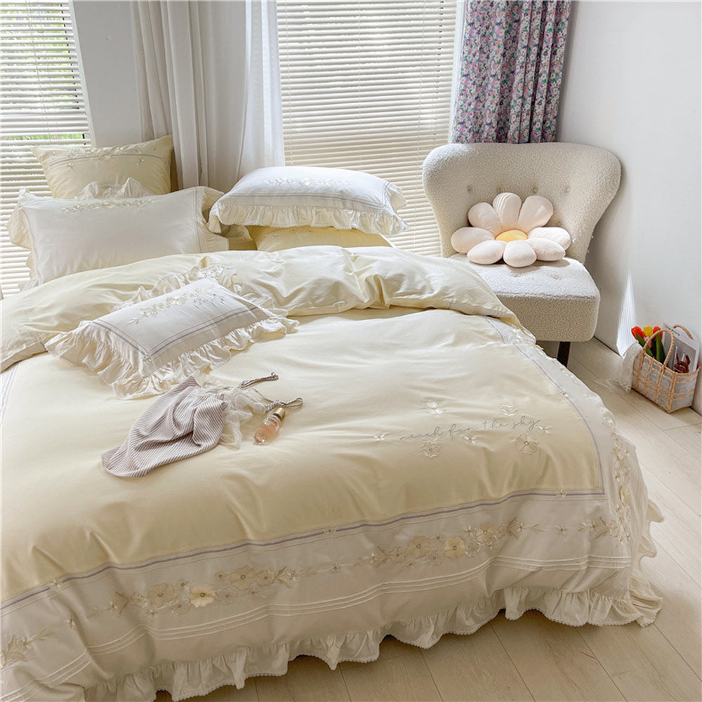 Neatly made bed with lace details in a bright bedroom