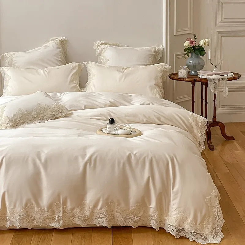 Neatly made bed with lace-trimmed bedding in a bedroom setting.