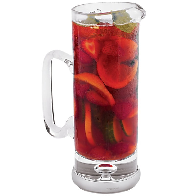 Clear glass jug with mounted sterling silver base on a white background