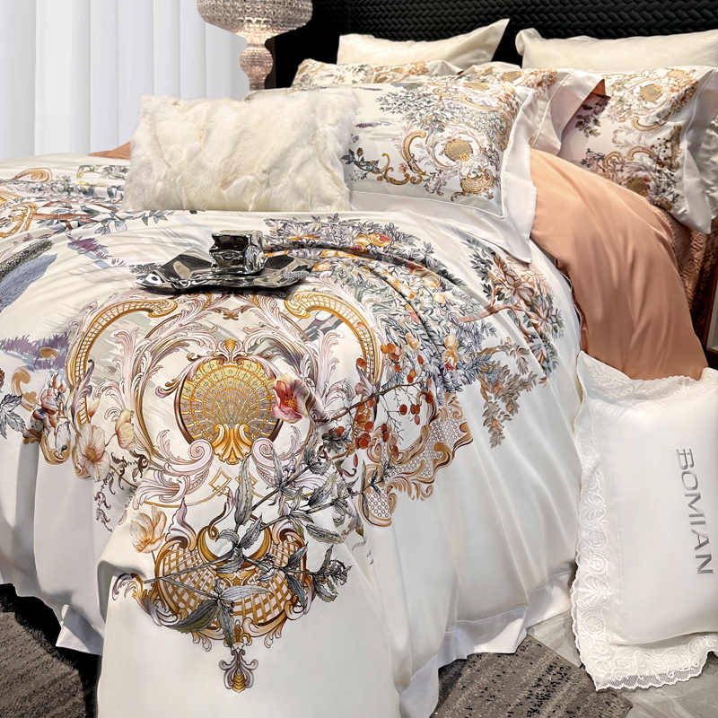 Decorative bedspread with intricate patterns on a bed, featuring the brand 'ROMAN'.