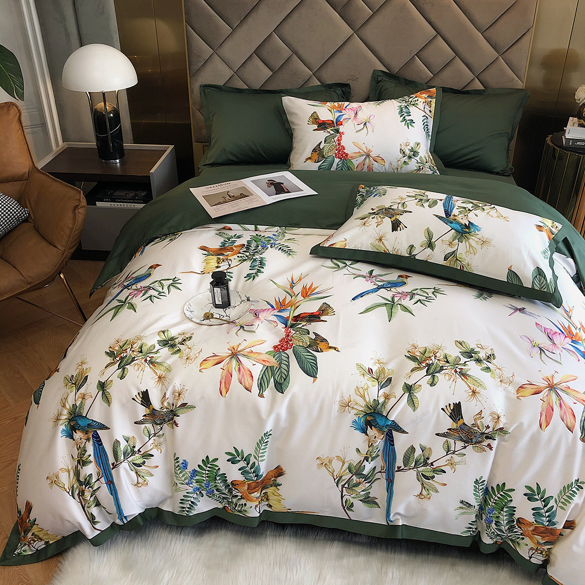 Bed with floral and bird patterned bedding in a bedroom setting.
