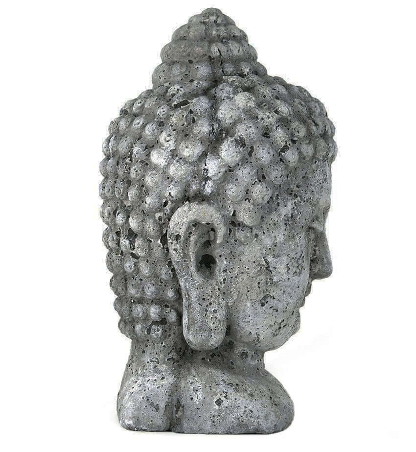 Stone-like Buddha head sculpture on a white background