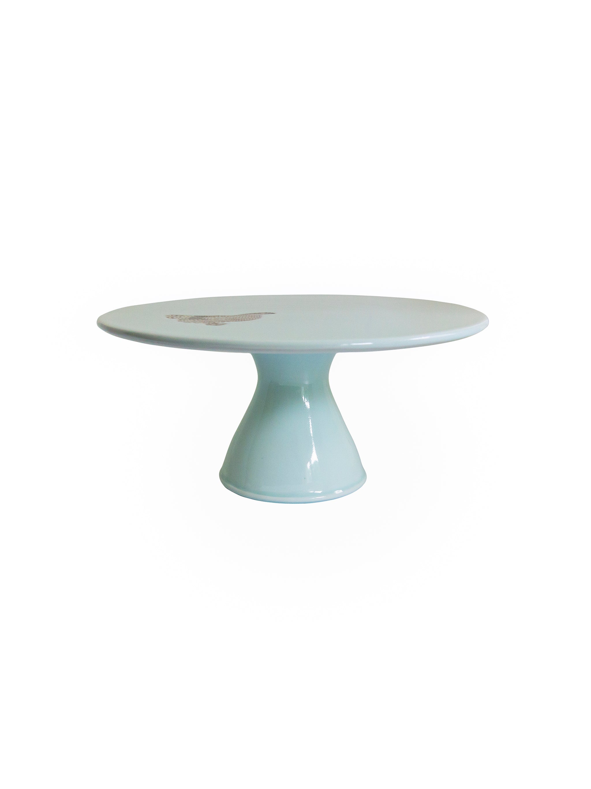 Cake stand with a hen motif on a white background