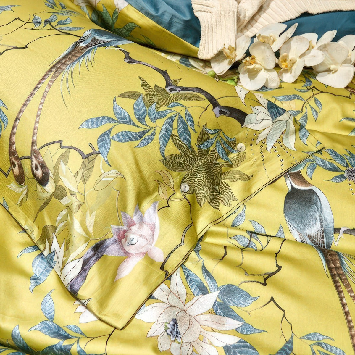 Yellow fabric with floral and bird pattern
