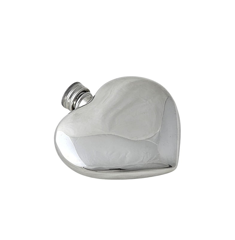Heart-shaped silver flask on a white background