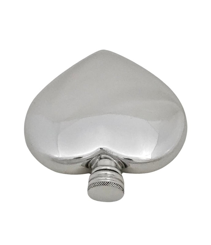 Overhead view of a pewter heart-shaped flask on a white background