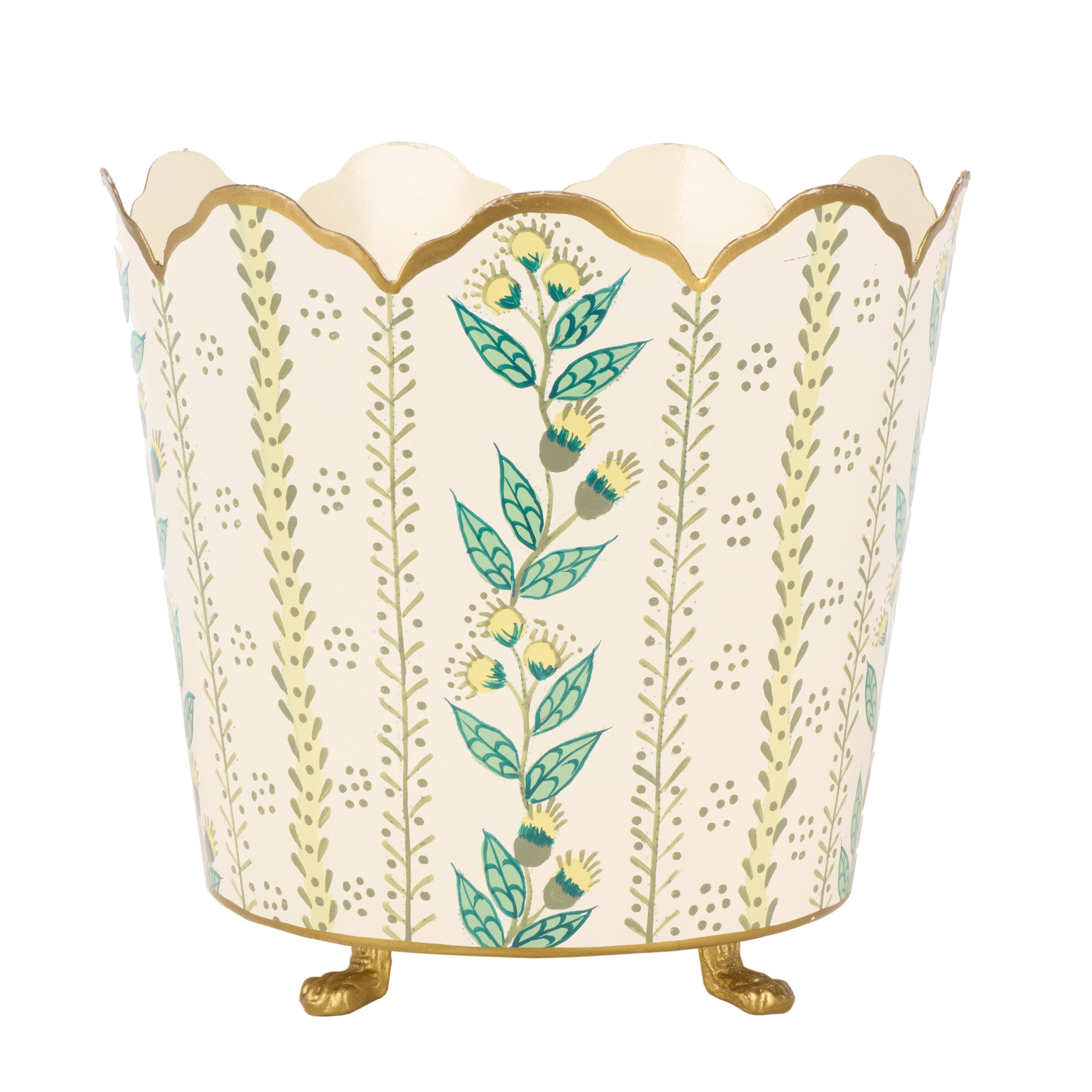 Decorative planter with floral design and gold feet on a white background