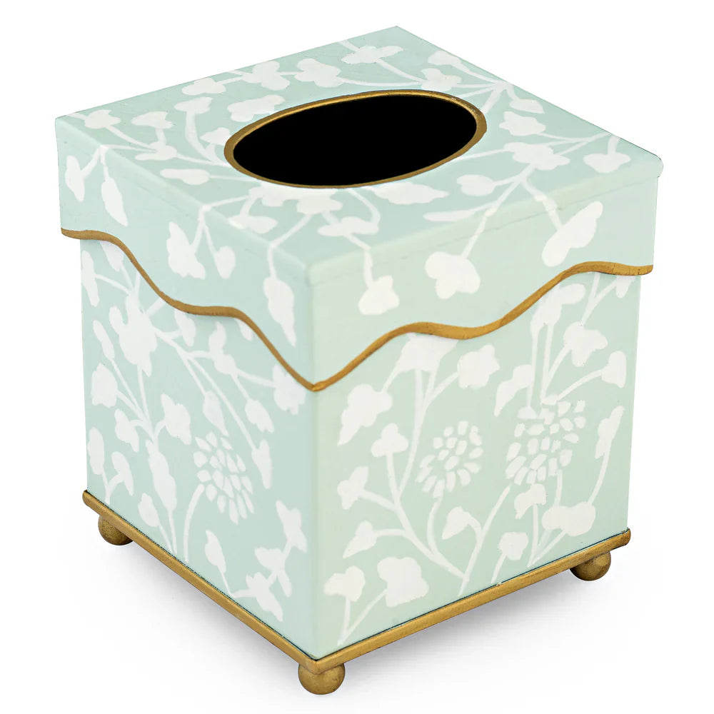 Tissue box cover with floral pattern on a light green background