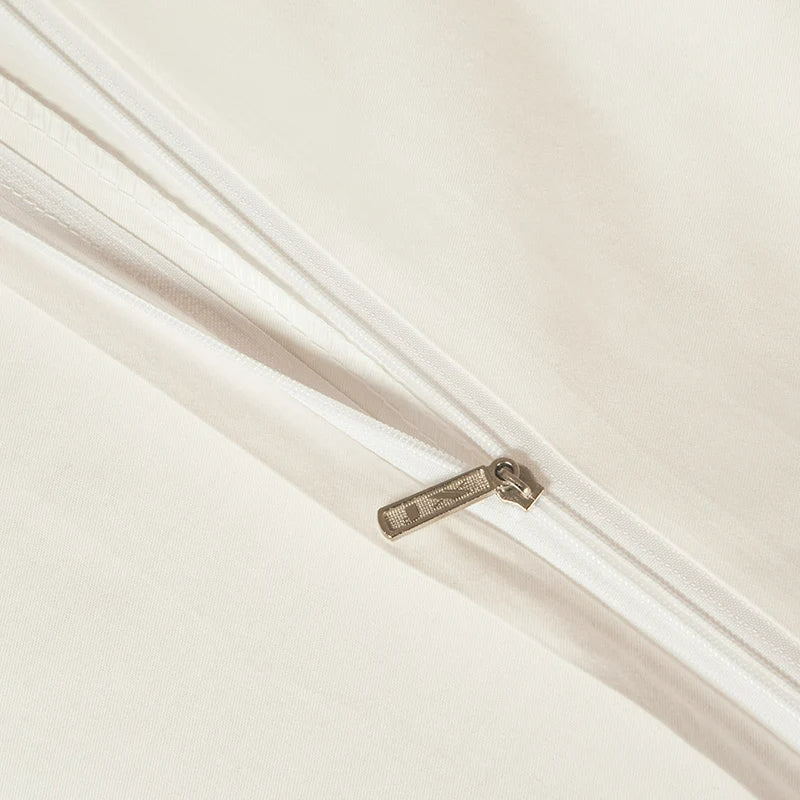 Close-up of a curtain rod with a decorative finial on a white background