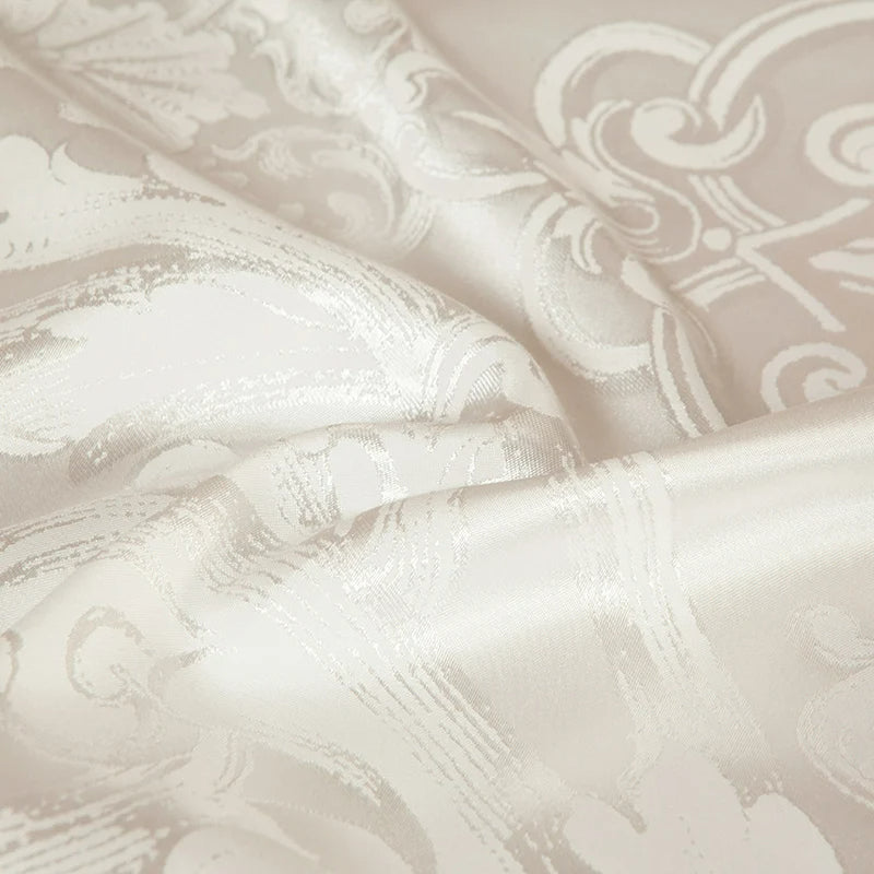 Close-up of textured fabric with intricate patterns in neutral tones