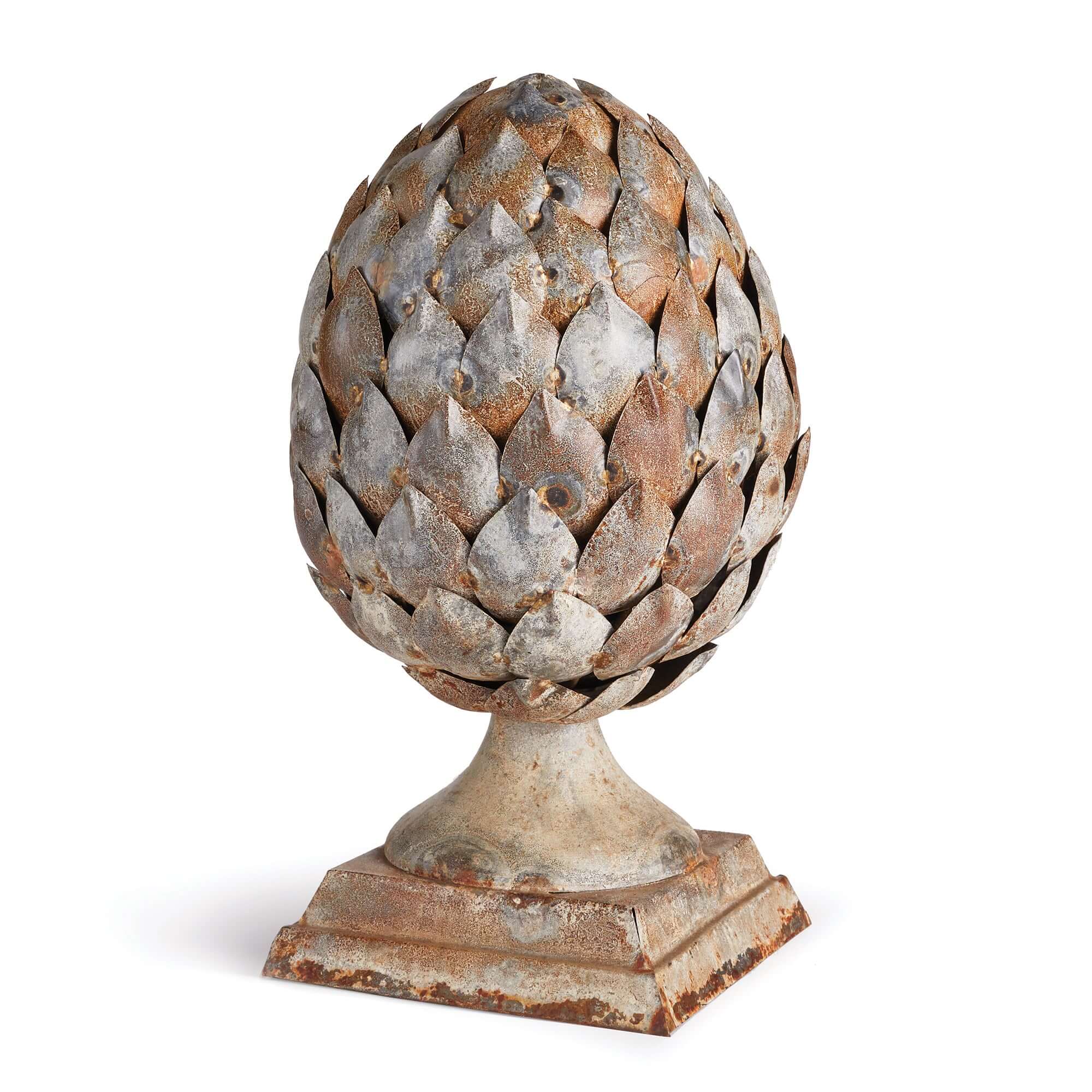 Decorative artichoke sculpture on a white background