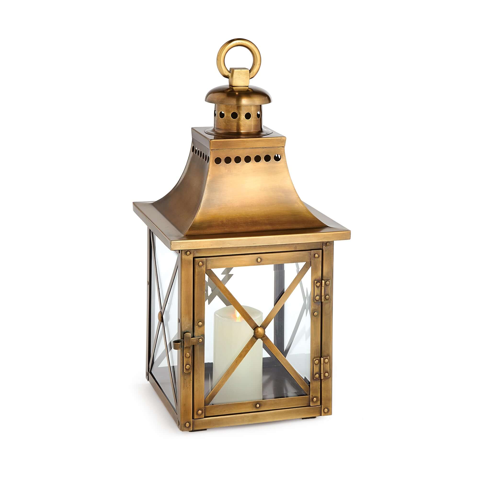 Gold lantern with a candle inside on a white background