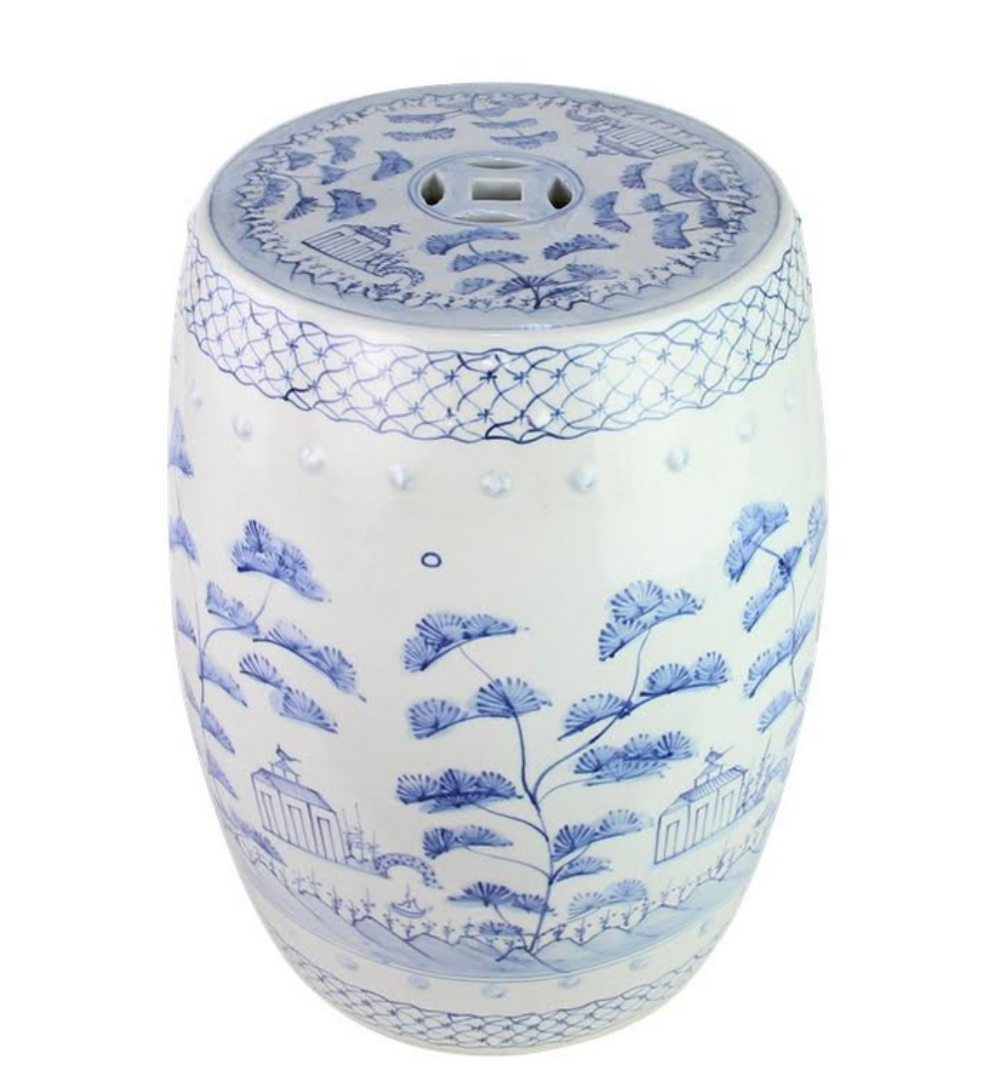 Ceramic stool with blue floral and landscape design on a white background
