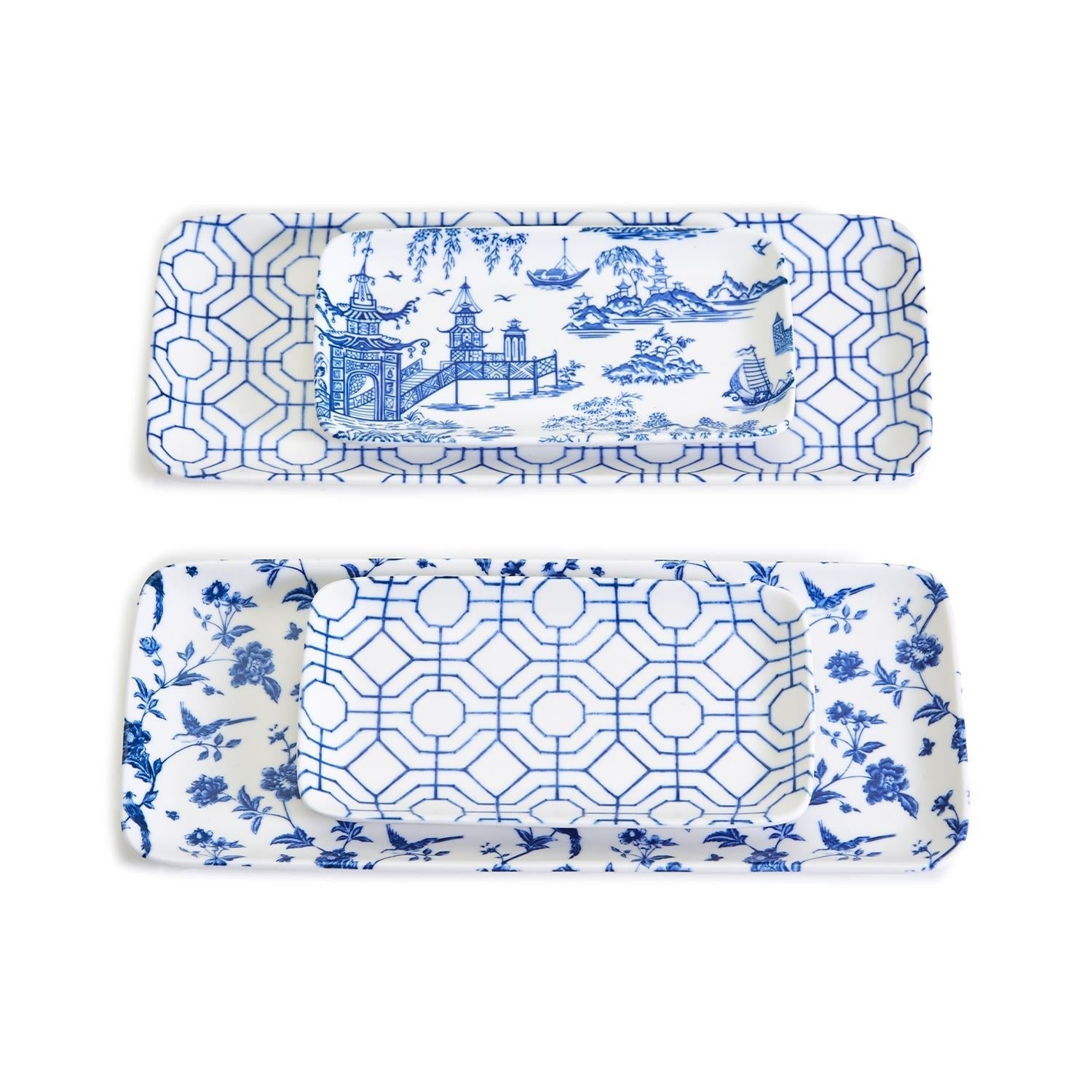 Two blue and white patterned trays on a white background