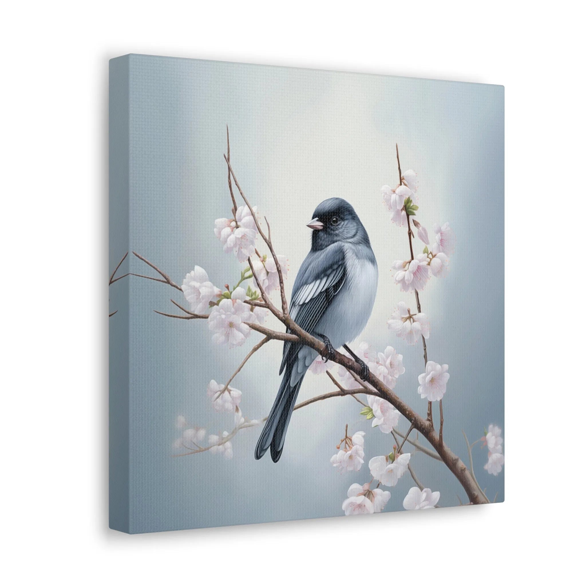 Canvas print of a bird perched on a branch with cherry blossoms against a light blue background side view