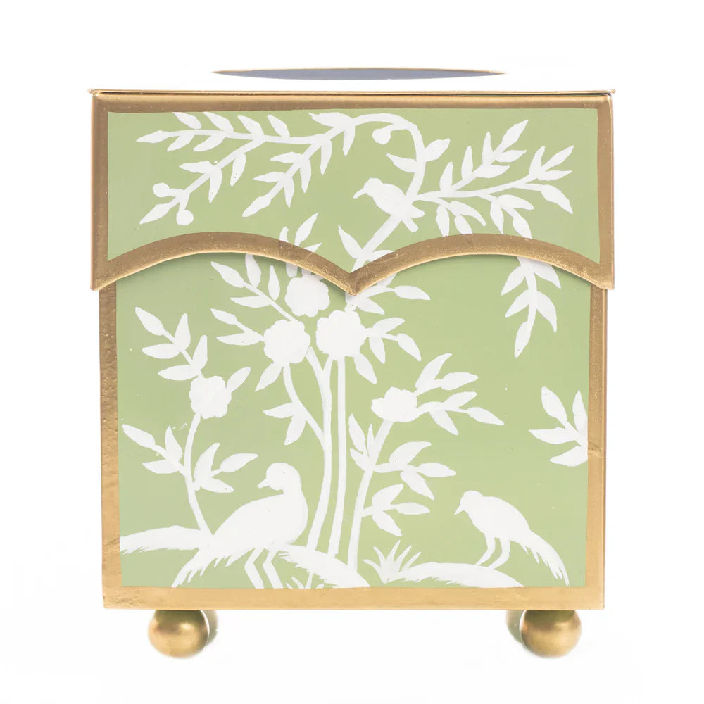 Decorative tissue box holder with white floral pattern on a light green background