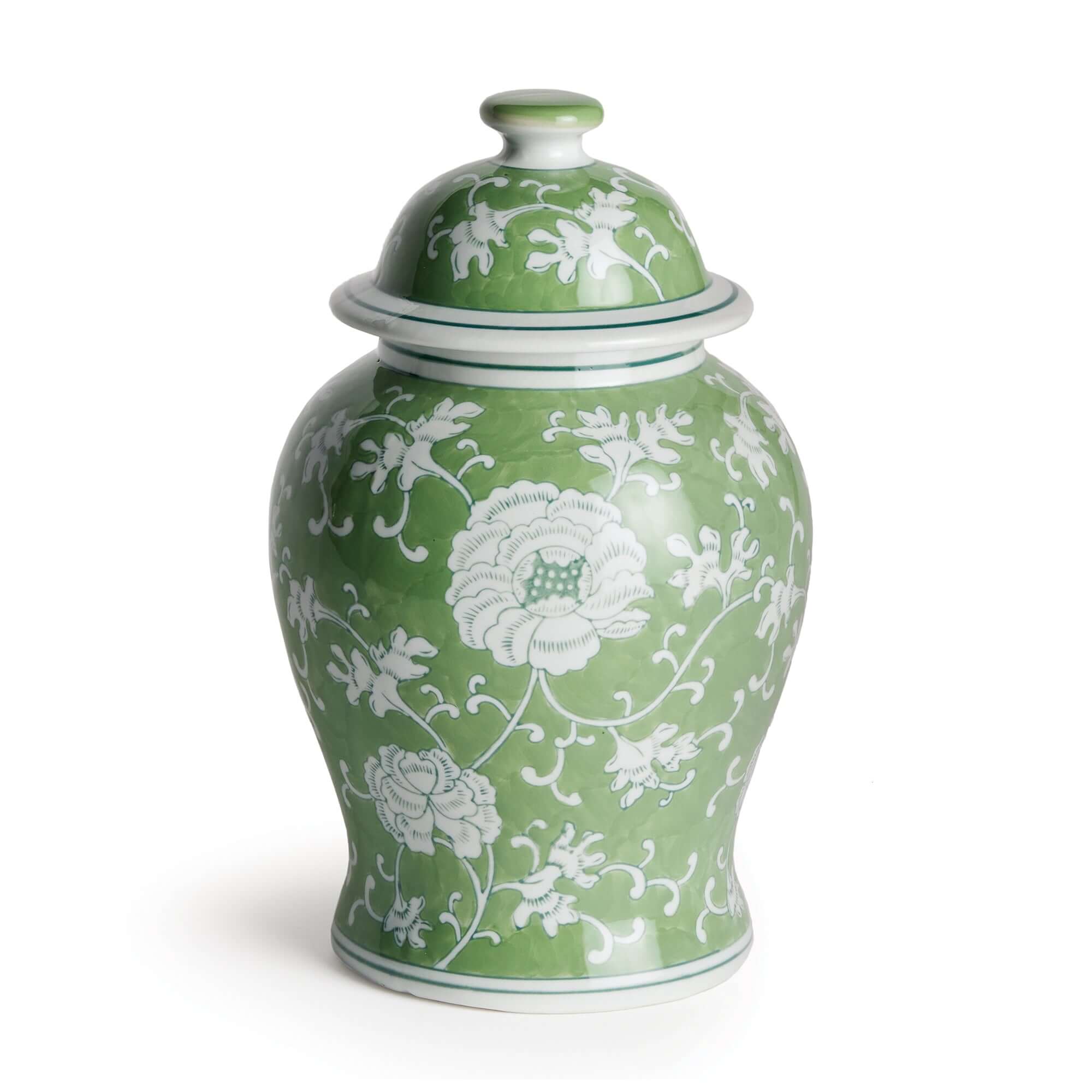 Green ceramic jar with white floral patterns on a white background
