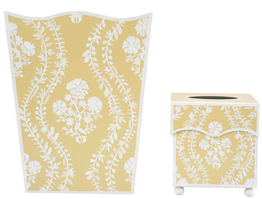 Yellow trash can and tissue box cover with white floral pattern on a white background