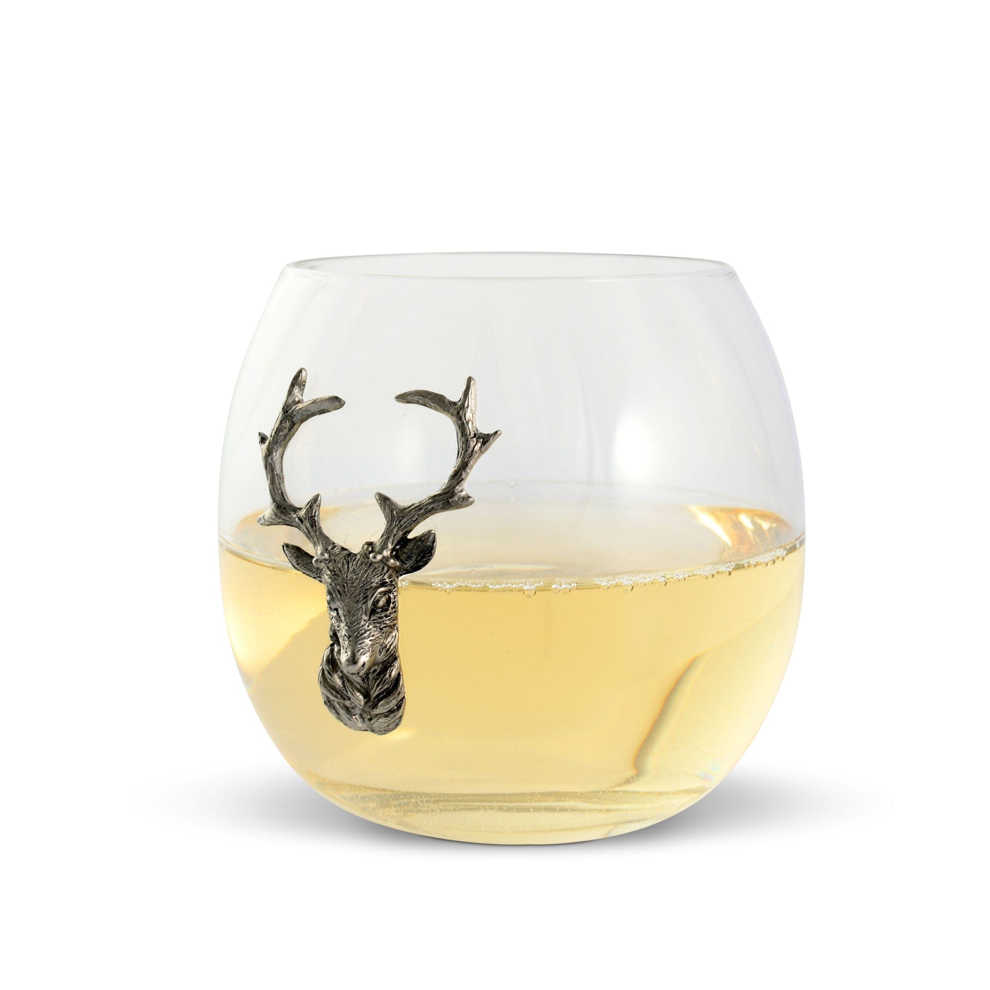 Glass tumbler with deer head design filled with a clear liquid on a white background