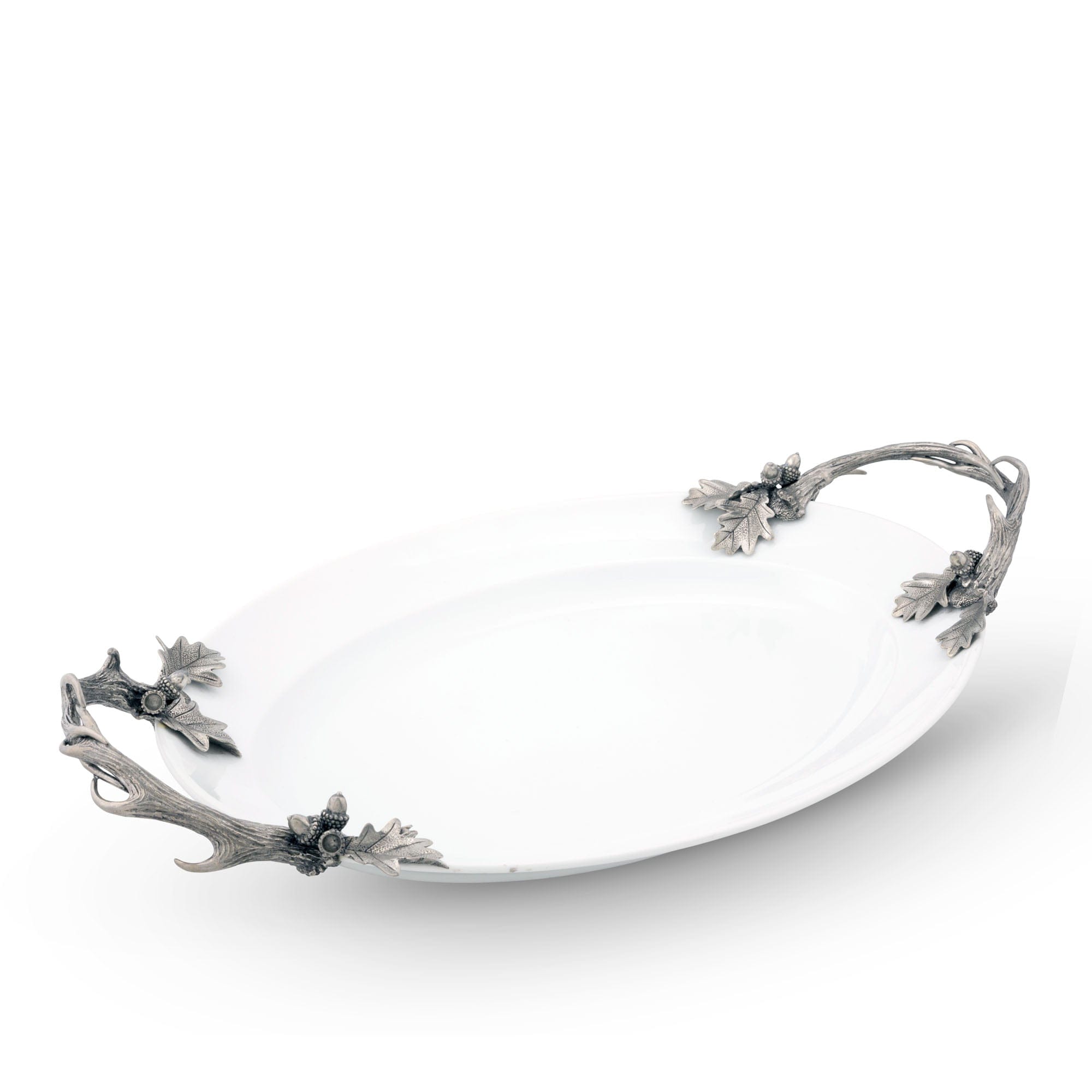 Decorative silver tray with floral handles on a white background
