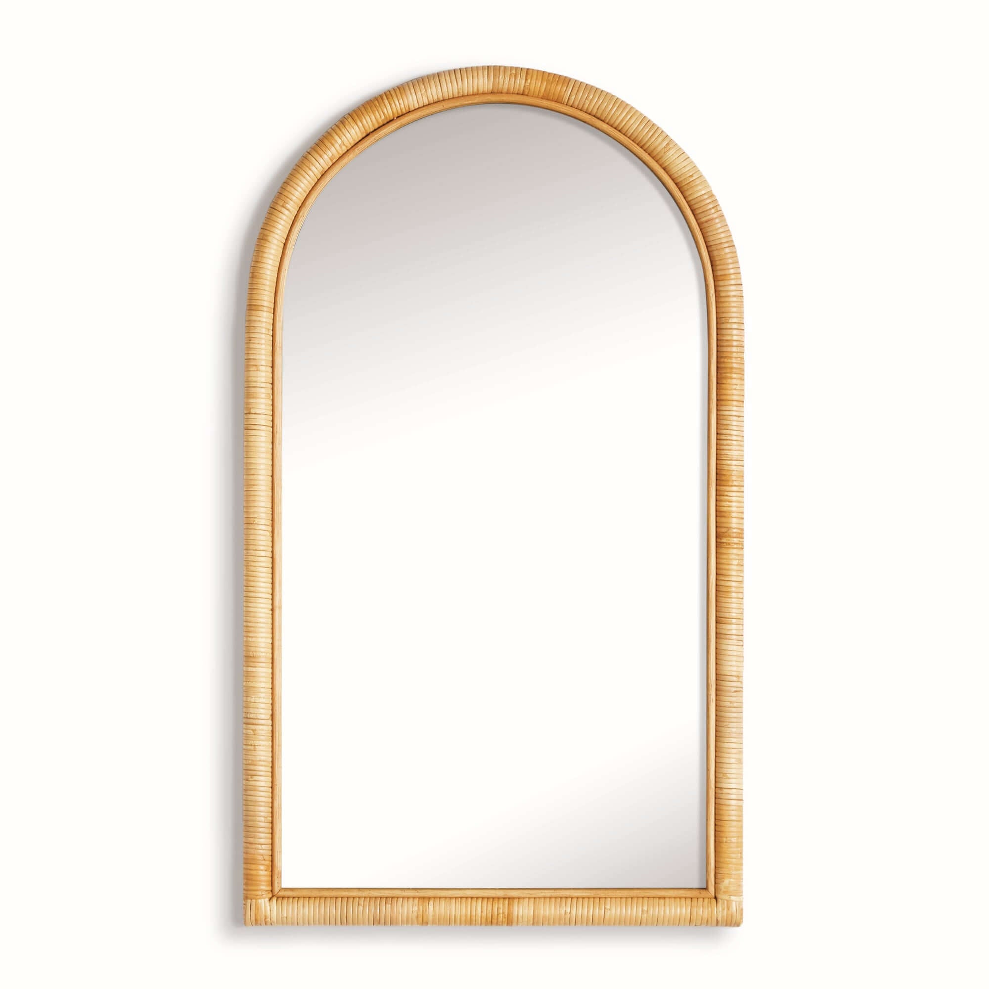 Arched mirror with rattan frame on a white background