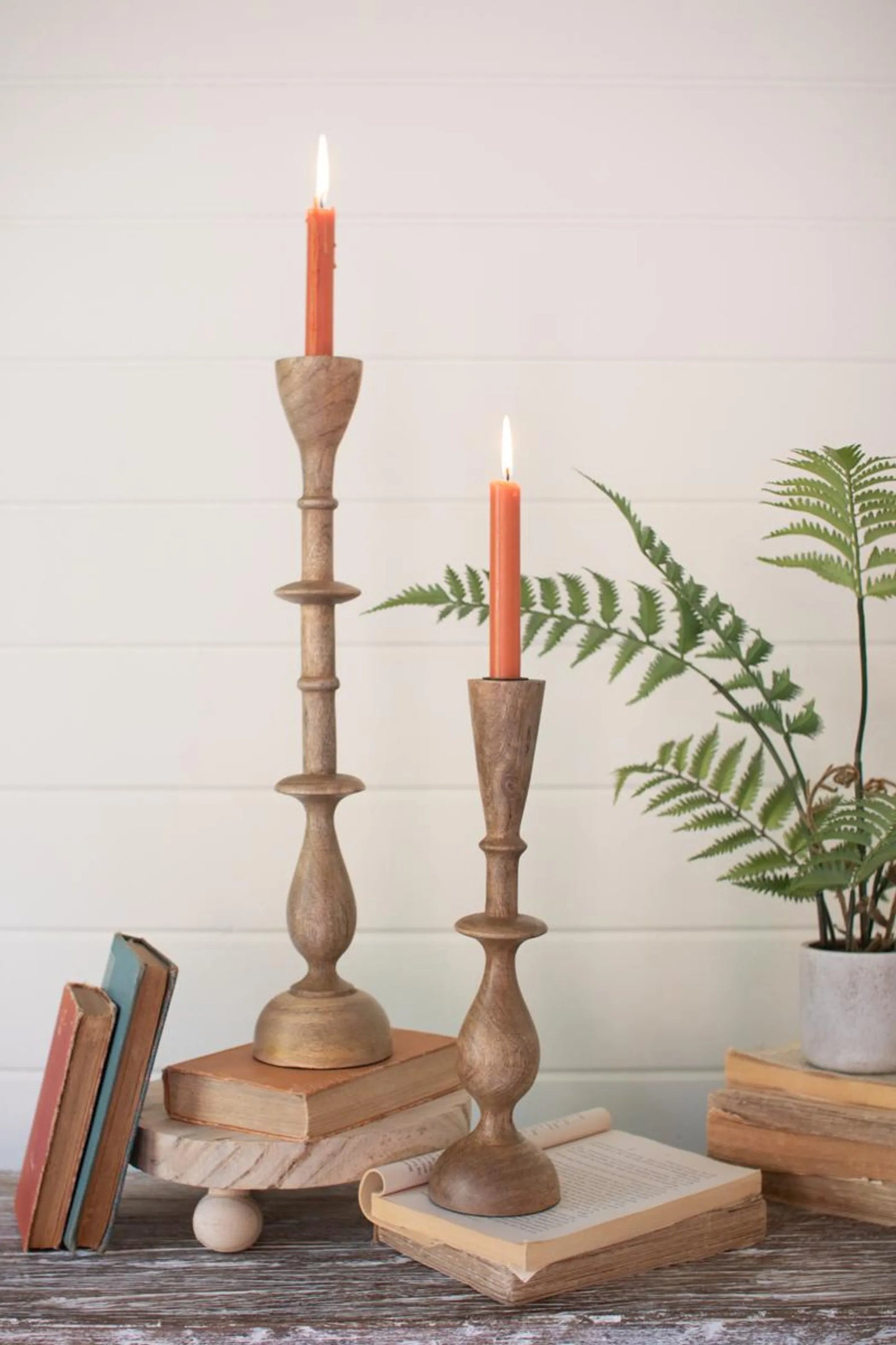 SET OF TWO MANGO WOOD CANDLE STANDS