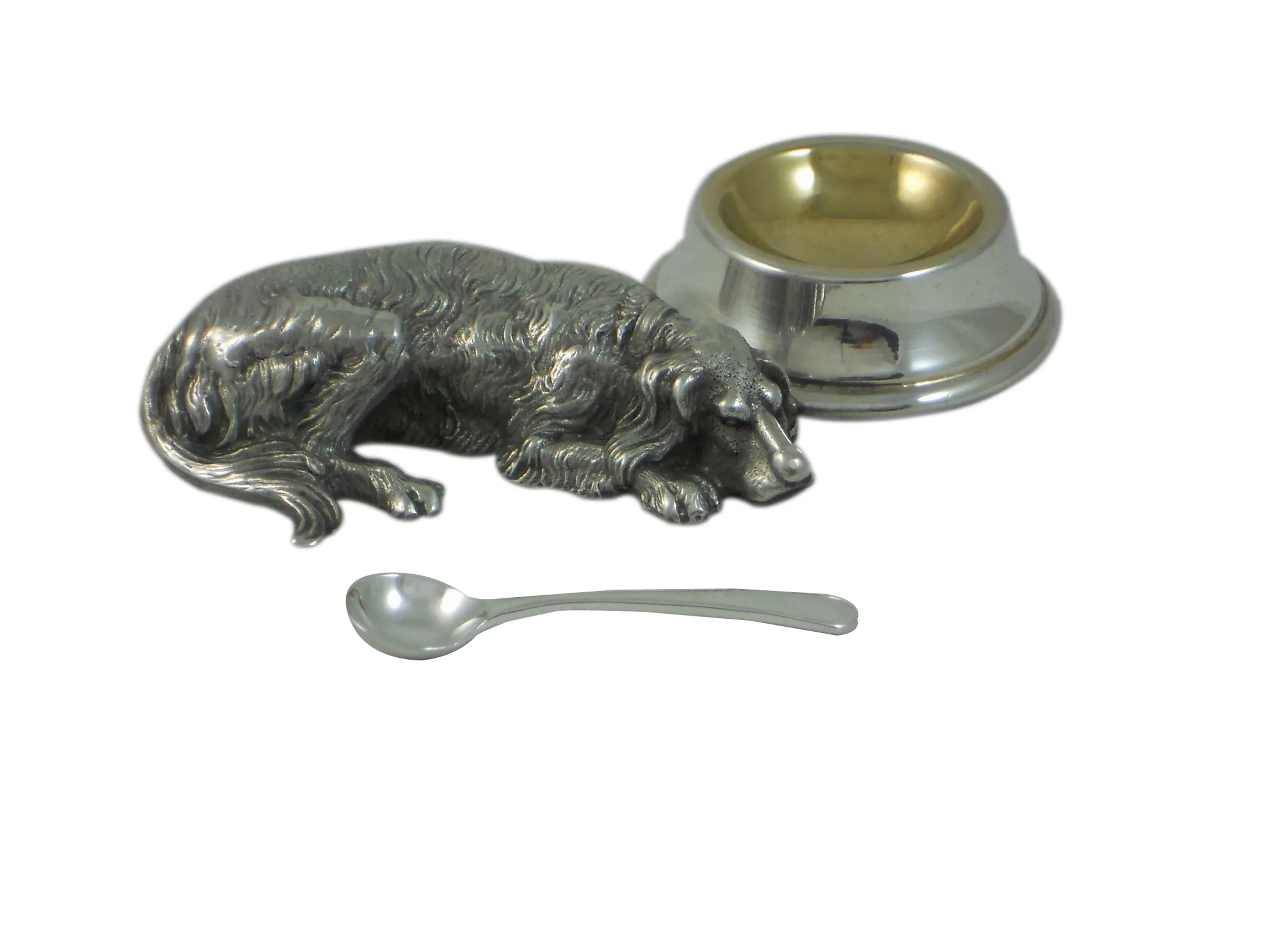 Silver-plated Irish Setter Dog-shaped salt cellar and spoon on a white background
