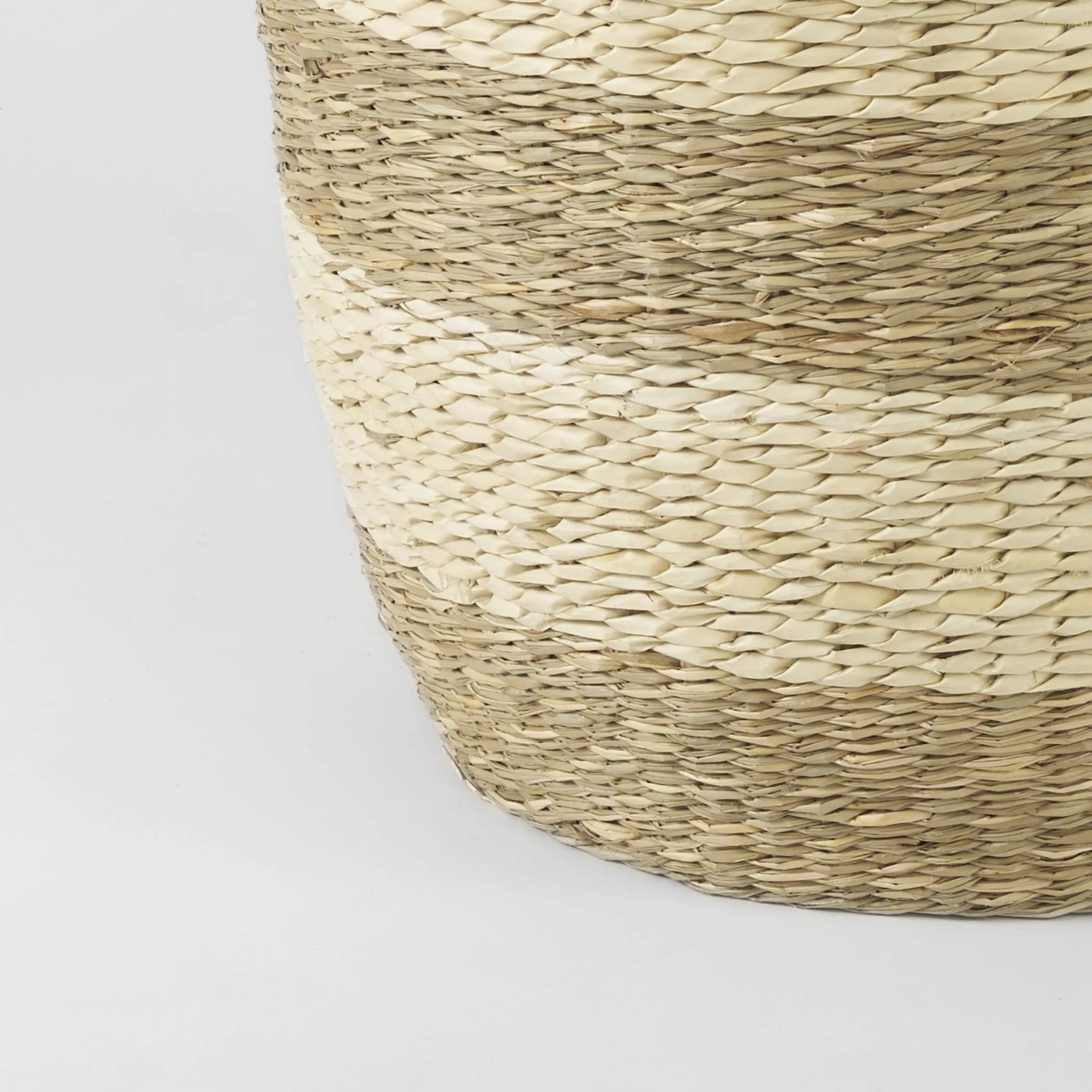 Close-up of a woven basket on a light gray background