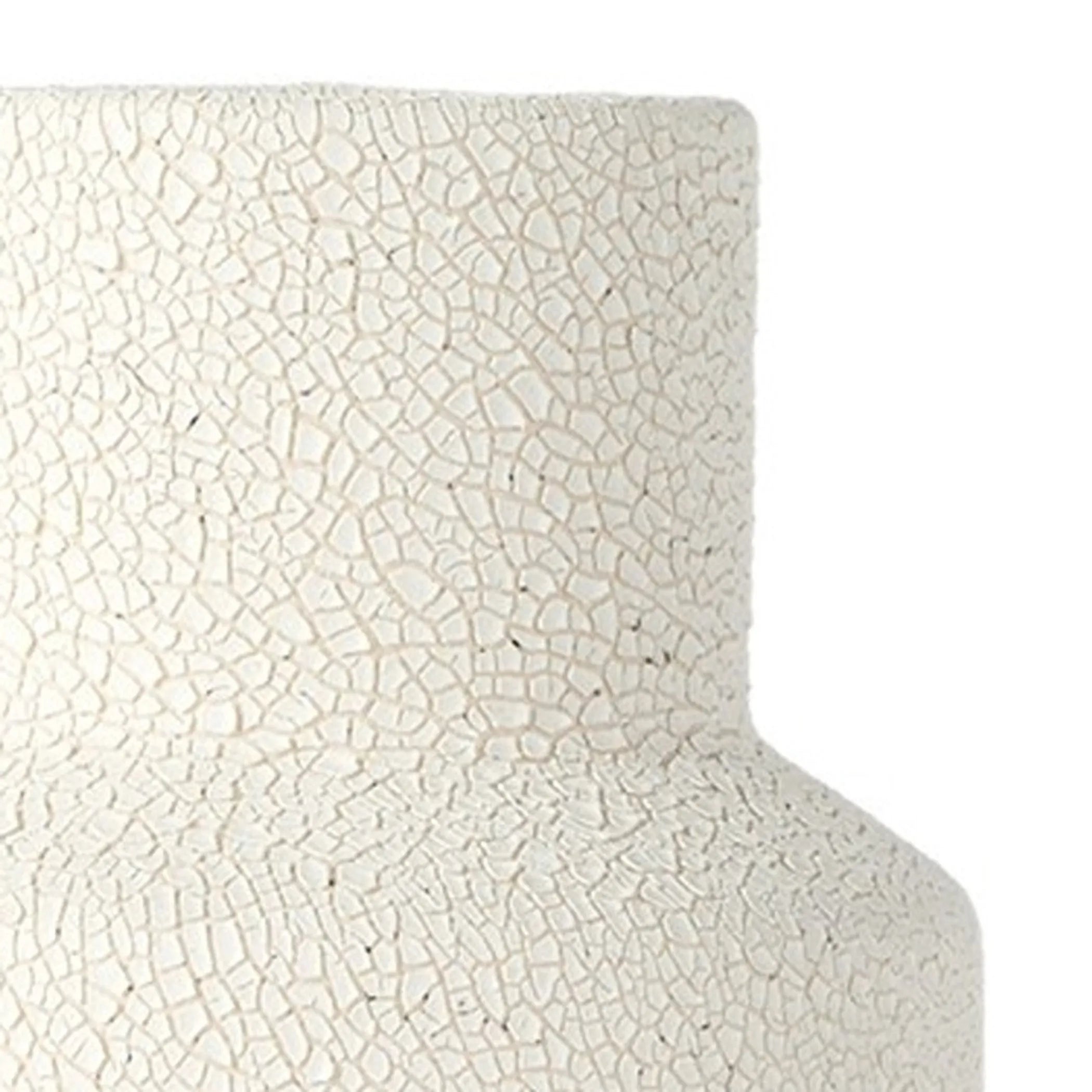 Close-up of a textured white vase on a white background