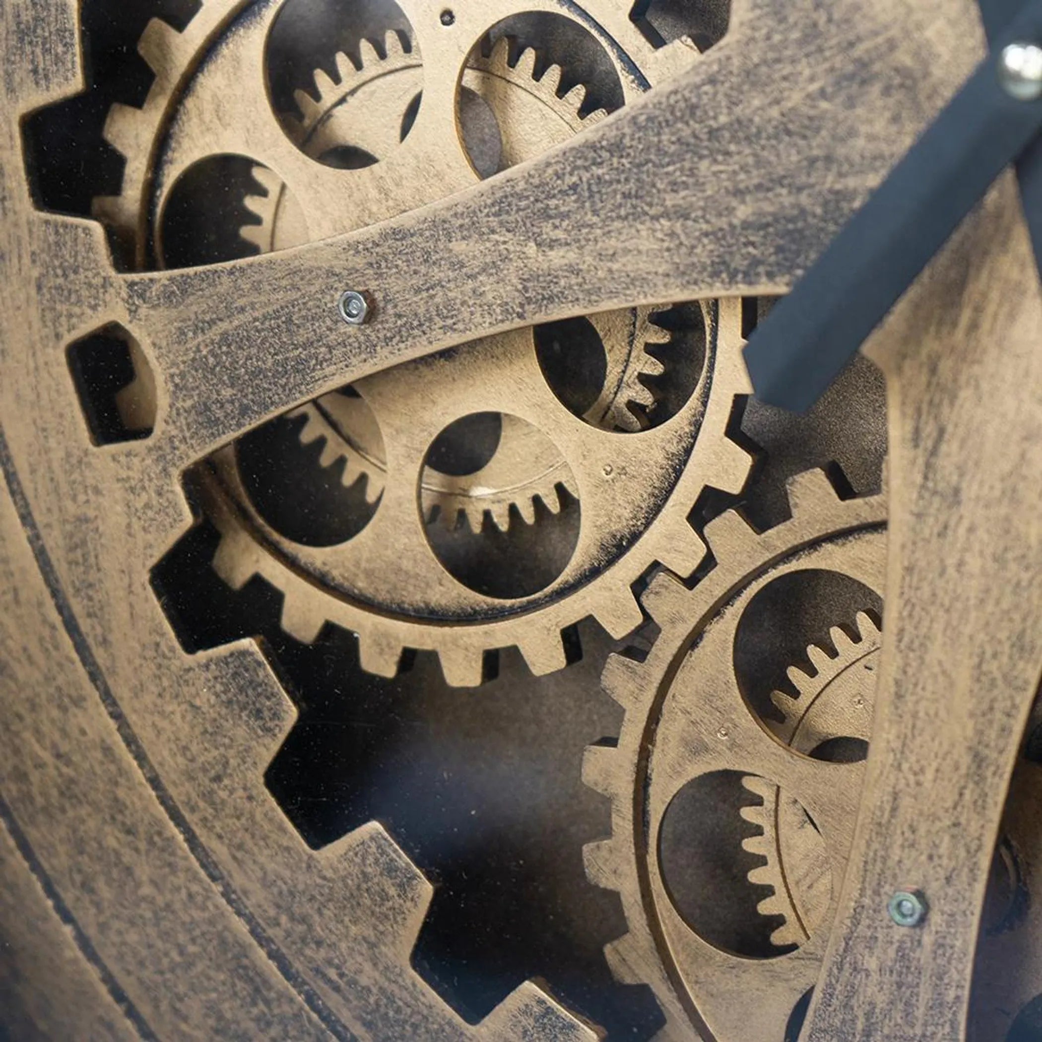 Close-up of mechanical gears with a focus on intricate details.