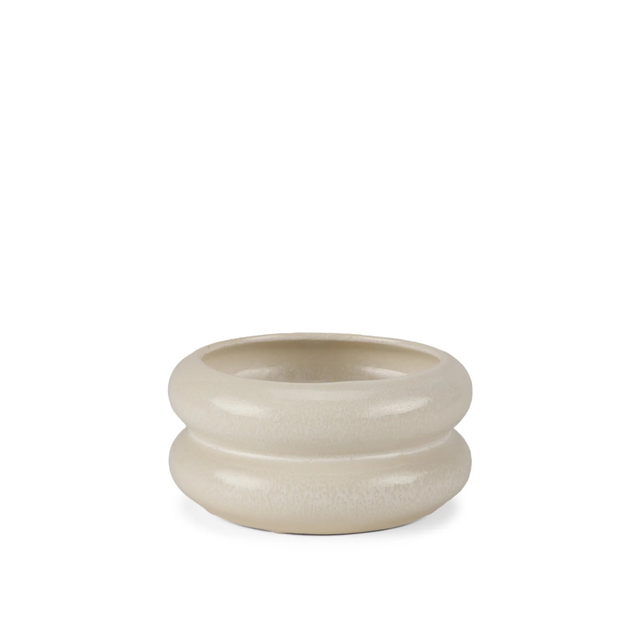 Beige ceramic planter on a white background