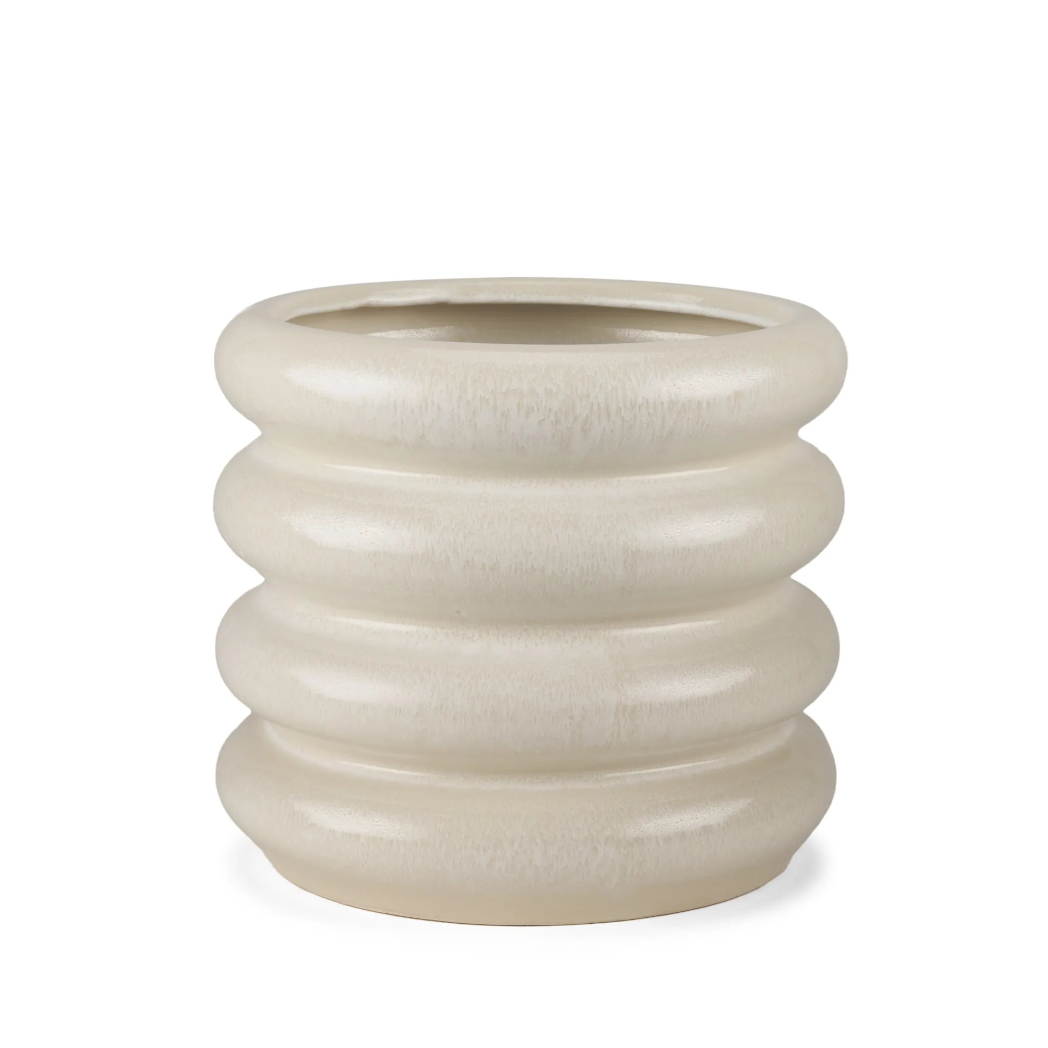 Beige ceramic vase with ribbed texture on a white background