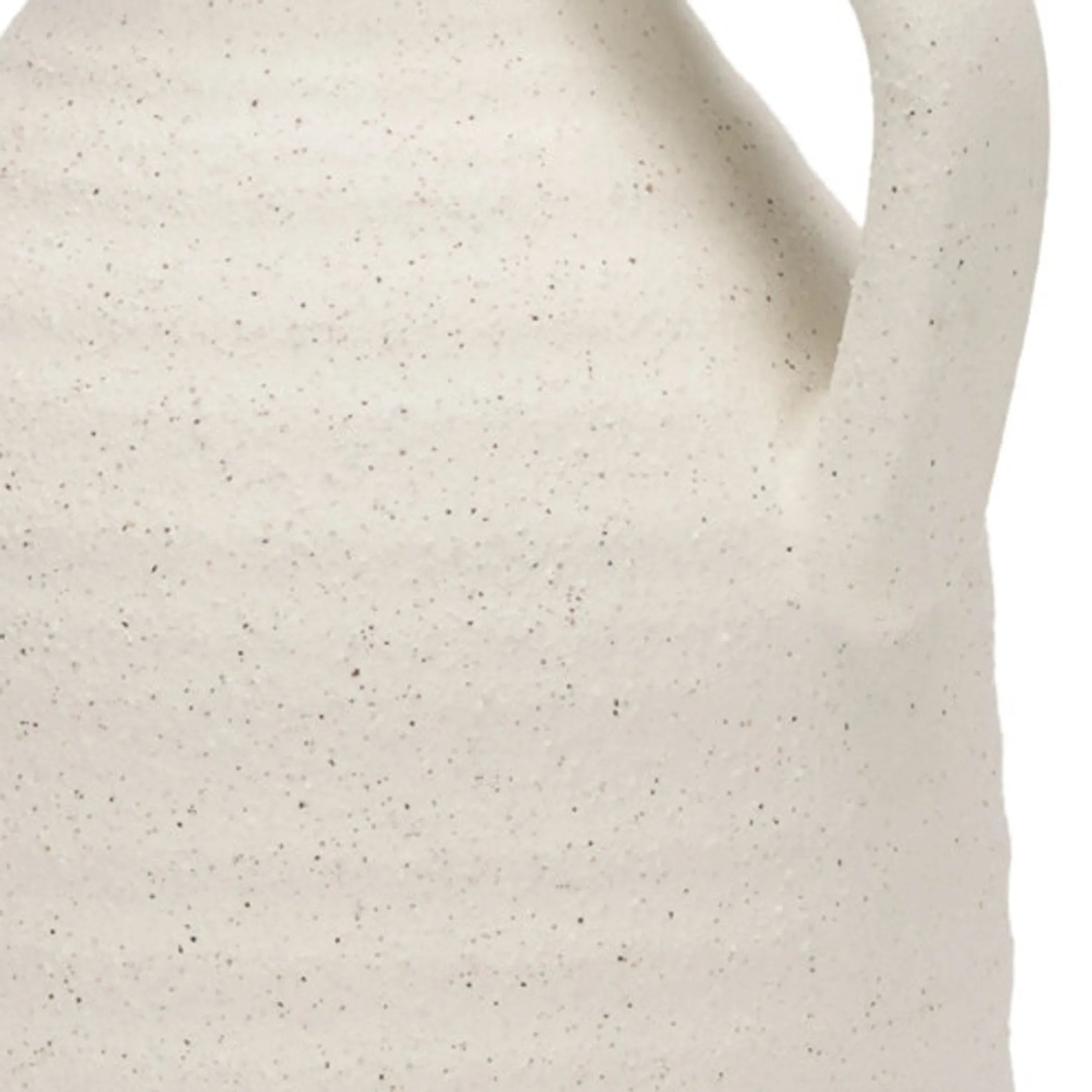 Close-up of a textured ceramic vase on a white background