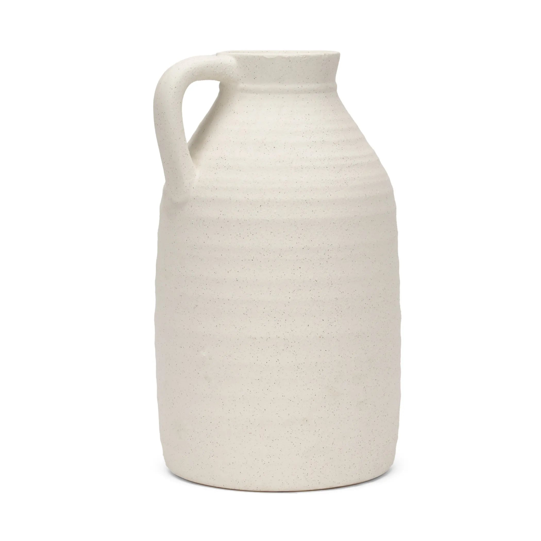 White ceramic pitcher on a white background
