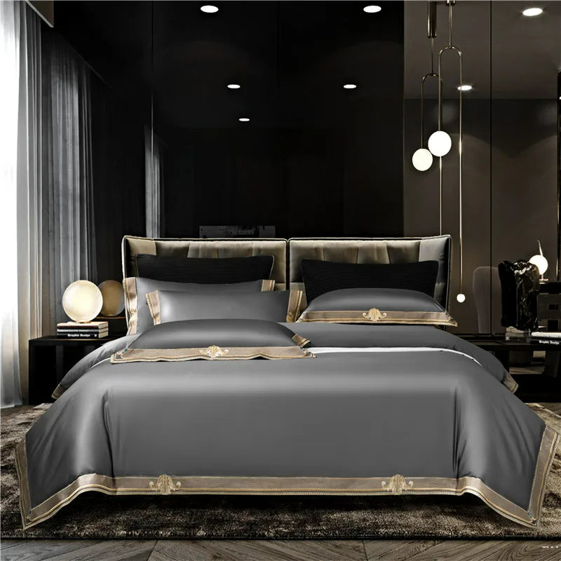 Modern bedroom with a large bed in a dark-themed room