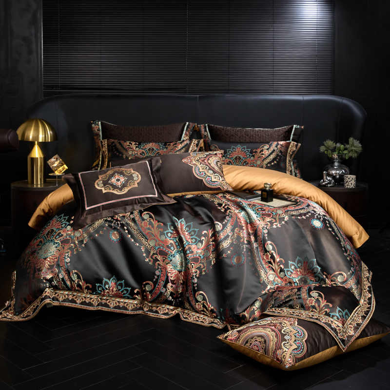 Decorative bedspread with intricate patterns on a dark background