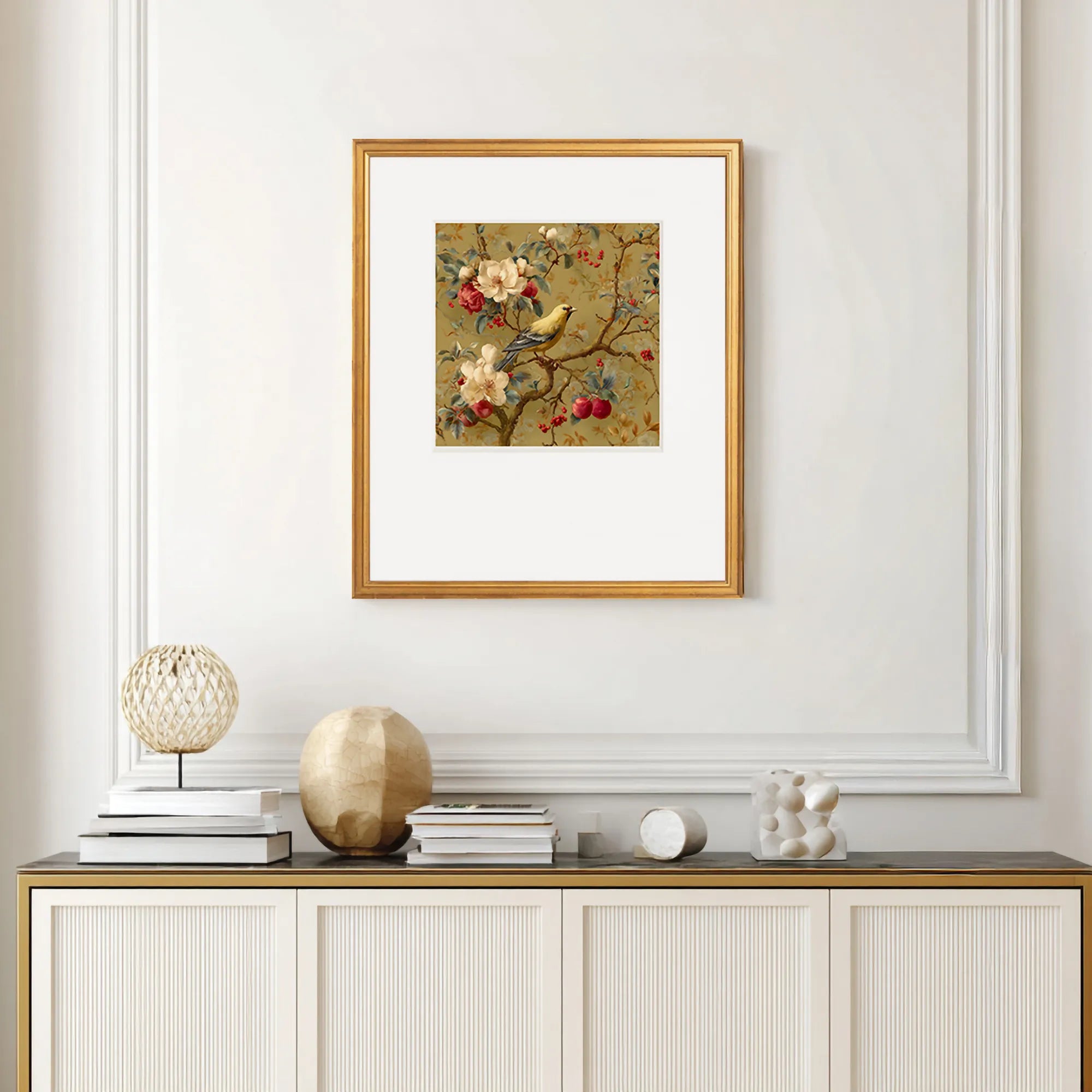 chinoiserie songbird in a gold frame on a wall of a luxury interior
