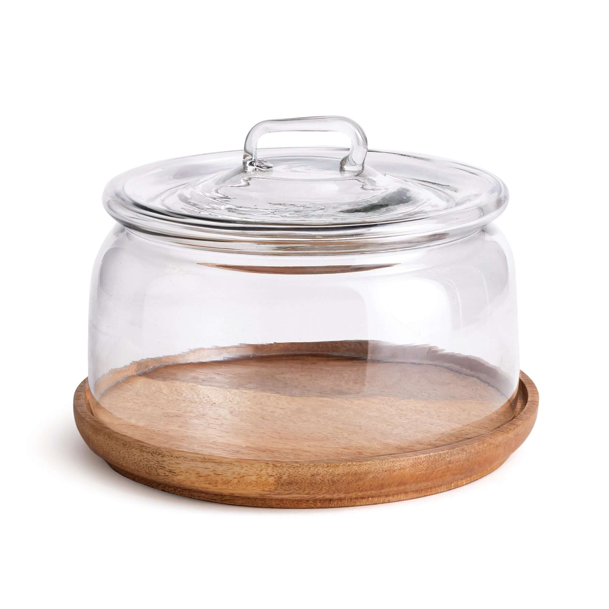 Glass cloche with wooden base and lid on a white background