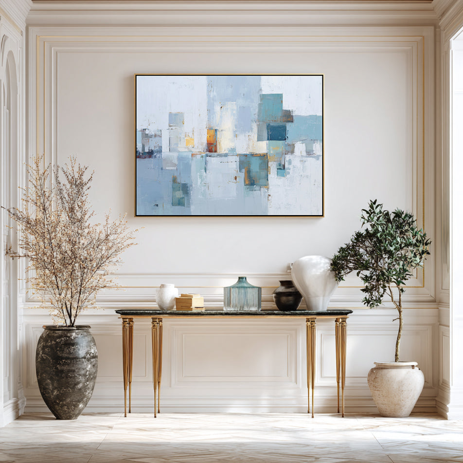 Modern interior with abstract art, console table, and decorative items.